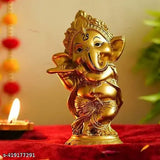 Artfully crafted poly resin Ganesha statue playing Bansuri, 10cmx14cmx10cm, Diwali decor item for home gifts
