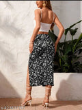 Printed polyester knee-length skirt for women, versatile design with elastic waistband, available in multiple colors and patterns