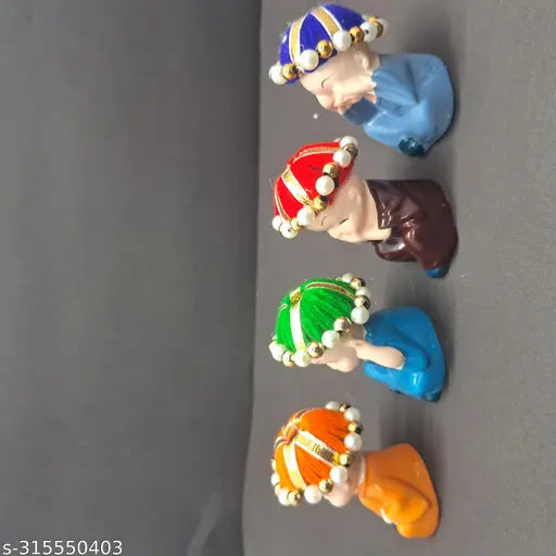 Multi-colored polyresin baby monk Buddha idols (4 pcs), vibrant decor for home, office & car