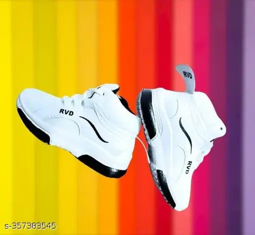 The image showcases white shoes with black accents. The shoes are displayed against a vibrant rainbow background