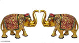 Colorful metal elephant idols set, 2 medium figurines for home temple, office gifting, symbolizing happiness and prosperity. Dimensions: L-B-H-8x2.5x6 cm. Indian origin