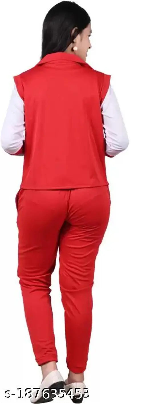 Red and white print on red dress, short sleeves, printed pattern, woman walking in background