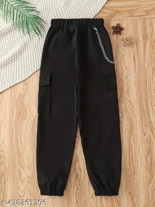Black cargo pants with drawstring waist, side pockets and adjustable straps