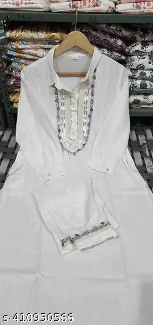 Embroidered rayon kurta set with palazzos, three-quarter sleeves for women