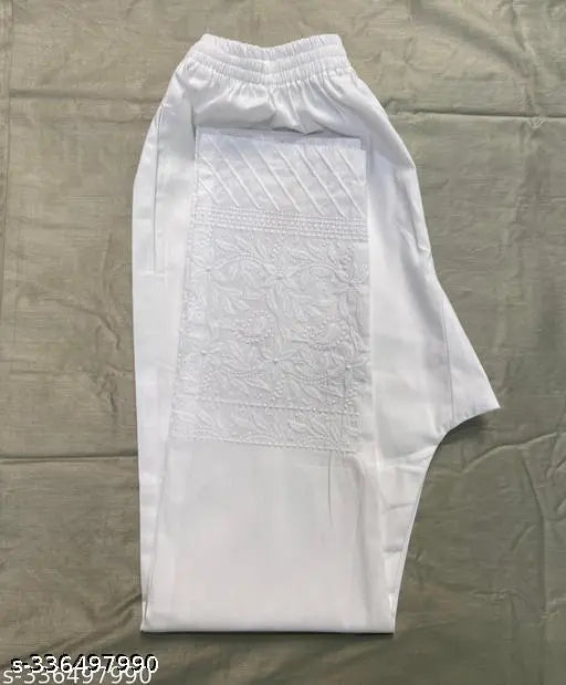 White Lycra Cotton Lucknowi Embroidered Pant for Women, features side pockets. Size: M (34), L (36), XL (38), XXL (40)