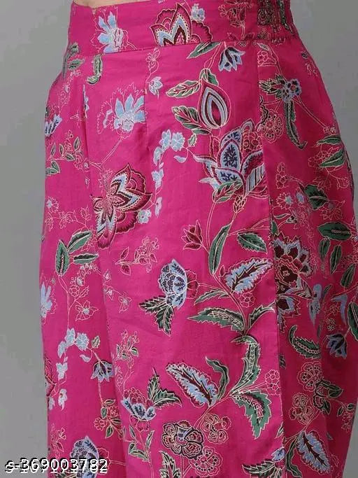 Pink rayon kurta and patiyla plazzo set with three-quarter sleeves, printed net pattern. Indian women's fashion set featuring kurta and pants. Single size available in various measurements