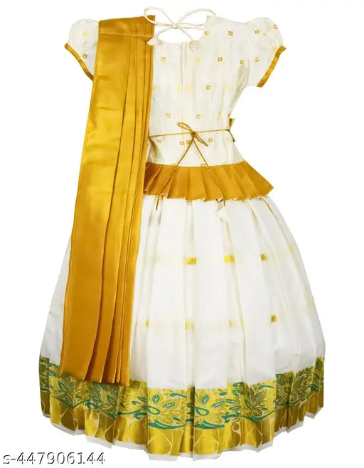 White cotton & gold kids' Lehanga Cholis with traditional Kerala pavada design, ideal for festivals