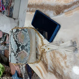 Blue, snake skin texture clutch handbag with metallic closure