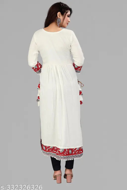 White kameez with paisley design, long sleeves, traditional cut