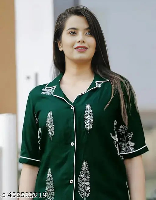 Green rayon night suit shirt with pallazo, printed net pattern on display