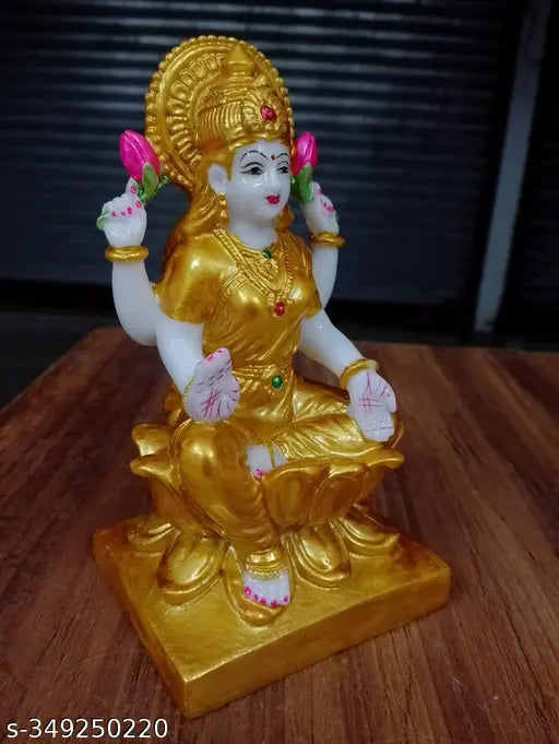 Marble-dust Laxmi Maa statue, gold resin idol for home decor, 7 inch height, 4 inch length, 3 inch breadth