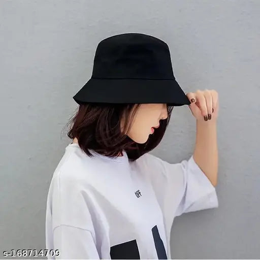 Black bucket hat, reversible with a different pattern inside