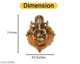 Gold metal Ganesh statue on pipal leaf with diya, decorative home office gifting item