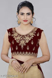 Beige net and maroon embroidered Bollywood-inspired saree set, perfect for weddings or formal events