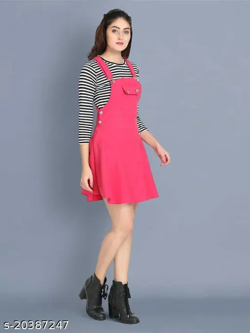 Pink cotton blend dungaree jumpsuit for women, solid net pattern on display