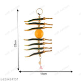 Yellow metal Nimbu Mirch wall hanging, 22.5cm long, removes negativity decor showpiece