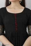Black, embroidered kameez with long sleeves and red trim