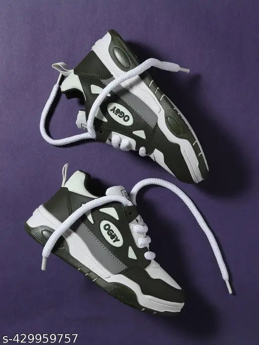 Black and white sneakers with white soles, laces, and branding