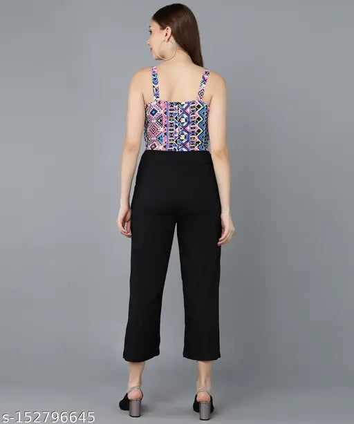 Multicolor printed net rayon sleeveless jumpsuit, solid black accents, Indian-origin fashion piece on mannequin