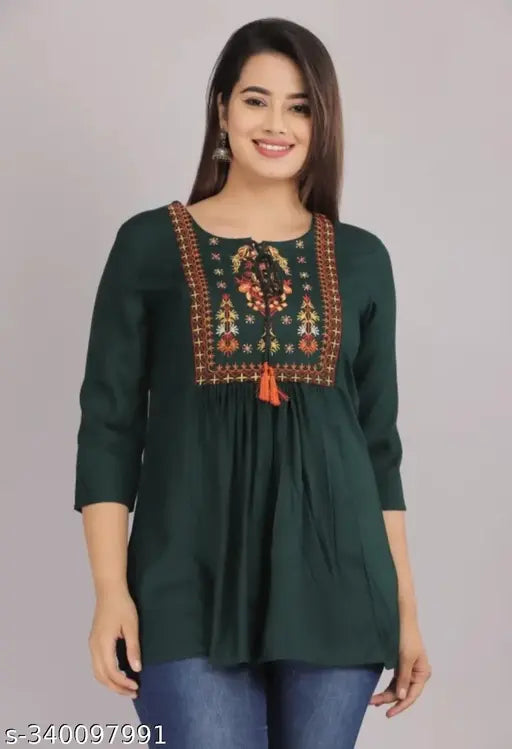 Embroidered rayon three-quarter sleeve top for women, Indian handcrafted net pattern on display