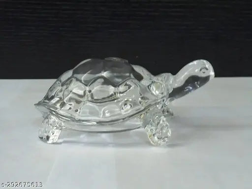Clear crystal tortoise Feng Shui showpiece for good luck, success, prosperity, and wish fulfillment. Made of glass, 12 cm long, 1.5 cm high, and 6 cm wide