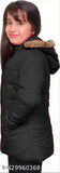 Black puffer jacket with hood, female model