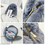 The image shows a cute cartoon rabbit-themed sling bag with a plush bunny charm. The bag is designed as a crossbody chain bag, featuring multiple pockets and compartments, suitable for girls on the go. The main color of the bag appears to be light blue, and it has a fluffy texture, similar to a bunny's fur. There are visible closures and card slots in the main pouch