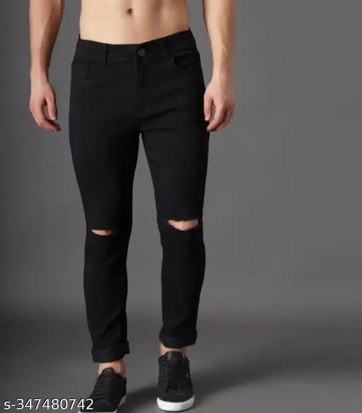 Black denim flaying men's knee-slit jeans, solid design, size 28, 30, or 32 from India