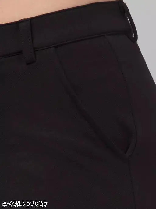 Black cargo pants with side pockets and belt loops, side zip closure