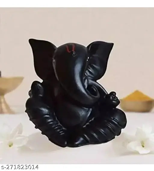 Black Ganesha idol, intricately carved resin showpiece for car dashboard and living room decor