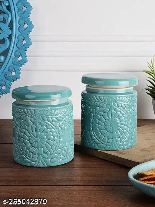 Two ceramic floral jars in a green set, with intricate detailing and a capacity of 900ml
