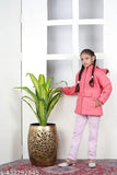 Pink puffer coat, hooded with white laces
