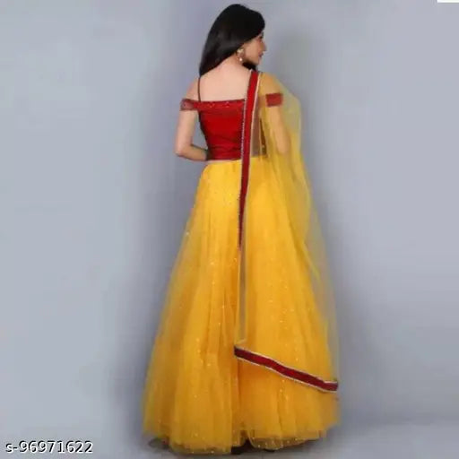 Yellow satin net lehenga with heavy embroidery, lace dupatta from Riva. Indian bridal wear