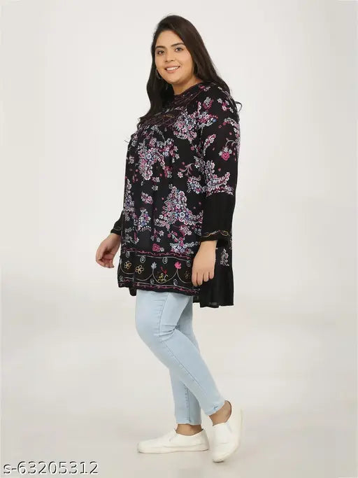 Black rayon floral print round neck top with long sleeves, Veldress brand, styled on mannequin