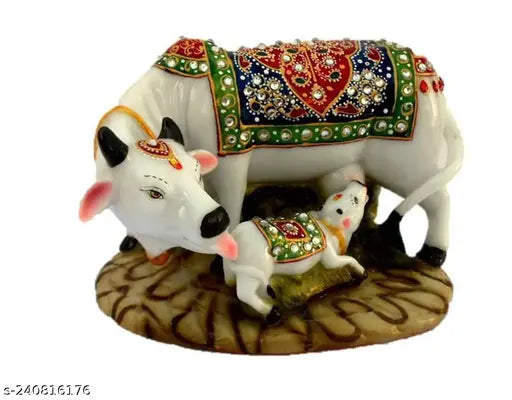 Multicolor handcrafted Polyresin Kamdhenu Cow and Calf statue, perfect for home decor or gifting, symbolizing prosperity and love