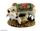Multicolor handcrafted Polyresin Kamdhenu Cow and Calf statue, perfect for home decor or gifting, symbolizing prosperity and love