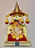 Multi-colored handcrafted Ganesha idol for home decor, ideal for living room and car dashboard. Polyresin material, elegant gift or showpiece for Diwali or housewarming ceremony. Indian origin