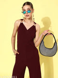 Maroon polyester sleeveless v-neck jumpsuit by Miss Chase, featuring a metallic buckle strap and asymmetrical front flap