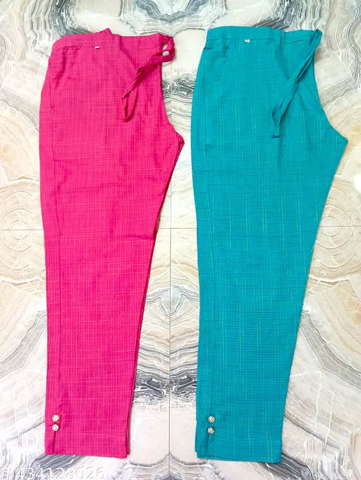 Teal, pink, and black yoga pants on display