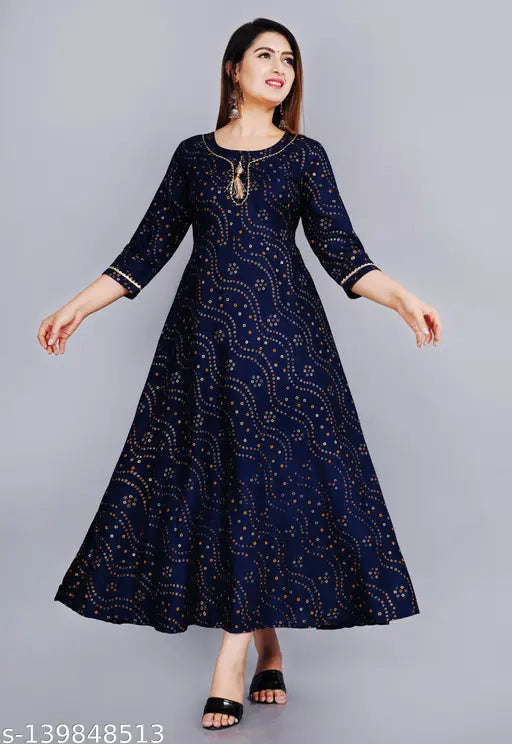 Rayon anarakali kurta with gold print, 3/4 sleeves, perfect for special occasions. Soft, flared style for casual comfort. Machine washable, Indian origin