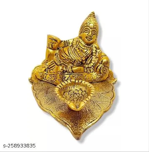 Metal Kamdhenu statue Chandra Art Collection Divya Shakti Kuber Deepak Oil lamp, gold-toned, 9cm tall, used in Lakshmi Kubera Pooja for material growth and prosperity, Indian origin