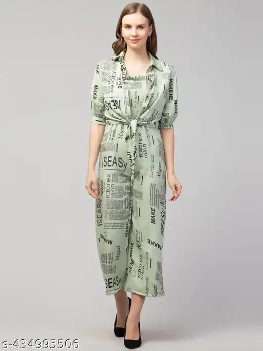 Green crepe three-quarter sleeve paperprint designer jumpsuit for women, featuring printed net pattern on display