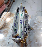 Blue and white floral handbag with gold chain strap