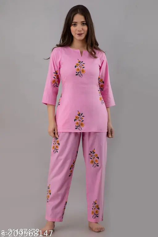 Women's cotton floral printed night suit set with three-quarter sleeves, featuring shirt and pyjamas. Indian-made ladies sleepwear with vibrant print