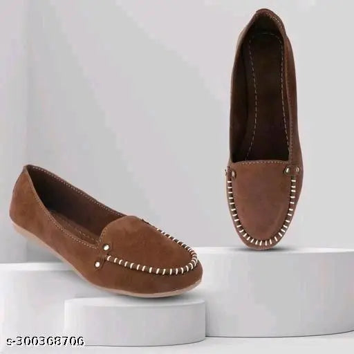 Brown suede women's loafers with silver detailing, slip-on style.