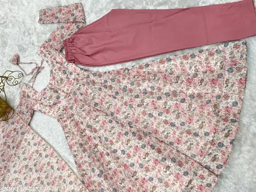 Traditional pink chiffon anarkali dance outfit, heavy orange floral print with fanny neck and churidar sleeves, Kashmiri Phirans for Chhath Puja and Diwali collection