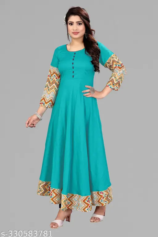 Aqua blue viscose rayon Anarkali kurti with long solid border, three-quarter sleeves. Casual yet versatile for office wear or social events. Available in multiple sizes (M - 7XL). Indian-made fashion dress of high quality and comfort