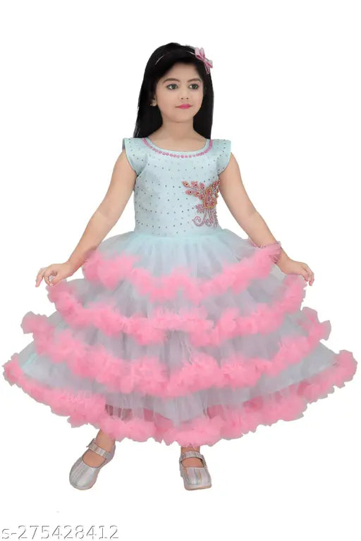 Pink net frock gown dress for girls, semi-transparent net fabric, vibrant pink color, embellished with sequins or beads, sleeveless design, perfect for special occasions, origin India
