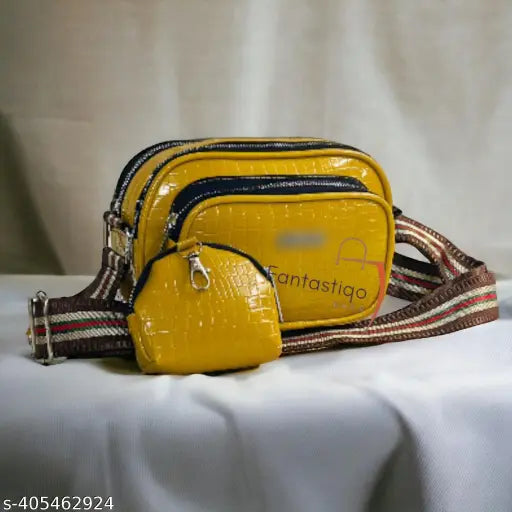 Ladies trendy womens sling bag with a brown strap, black accents