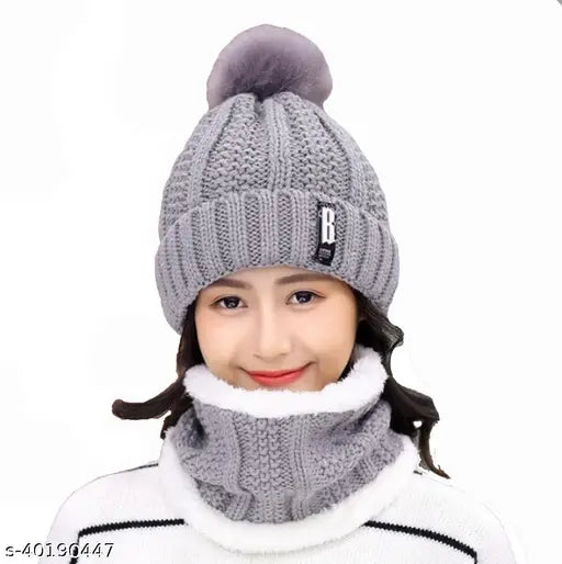 Grey winter beanie cap with fur trim and matching scarf